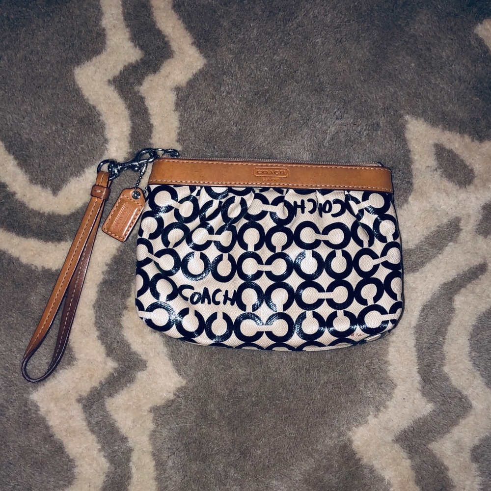 Tan and Black Coach Wristlet
